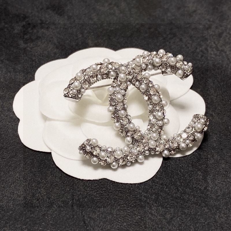 Ch**el brooches